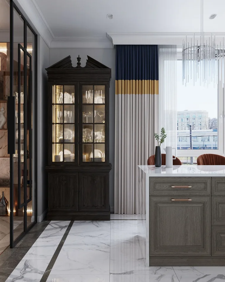 Floor length curtains with a contrast band skimming the floor beside a glazed cabinet